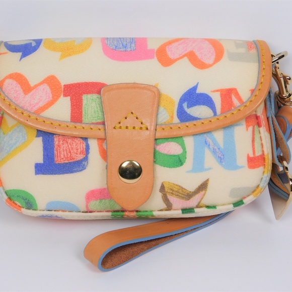 Dooney & Bourke Handbags - Dooney And Bourke Signature Wristlet
